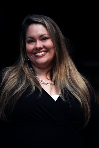 In this March 4, 2015 photo, Jennifer Rodriguez, executive director of the Youth Law Center, poses for a photo in San Francisco. A former foster child herself, she says traditional recruiting has often failed to identify the people who would be best at parenting troubled children. (AP Photo/Sophia Germer)